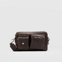 Front view of espresso brown genuine leather crossbody sling bag for men, featuring gusseted front pocket with invisible magnetic closure and adjustable leather strap attached with silver tone hardware