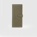 Travel wallet in dark olive pencil print leather with curved flap and gun metal tone hardware, plain background