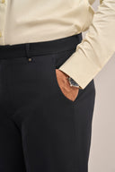 Close-up of yellow mandarin shirt featuring full sleeves and buttoned-cuff.