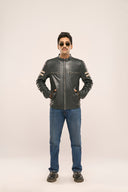 Man wearing navy blue leather Biker Jacket which is zipped up, paired with a pair of jeans, biker gloves and sunglasses