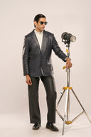Man wearing mens designer blazer jacket, navy blue nappa leather, structured fit, full sleeves, black pants and sunglasses