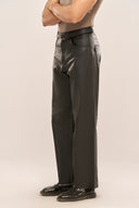 Man wearing straight-fit black leather pants crafted from premium, buttery-soft goat Nappa leather