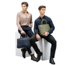 Quantum Leather Laptop Briefcase In Navy Blue Business Lifestyle Shot.